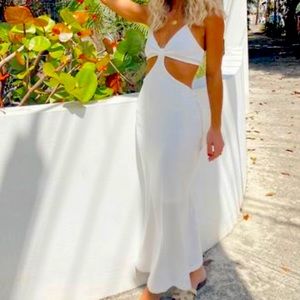 Amazing cut out midi white dress.